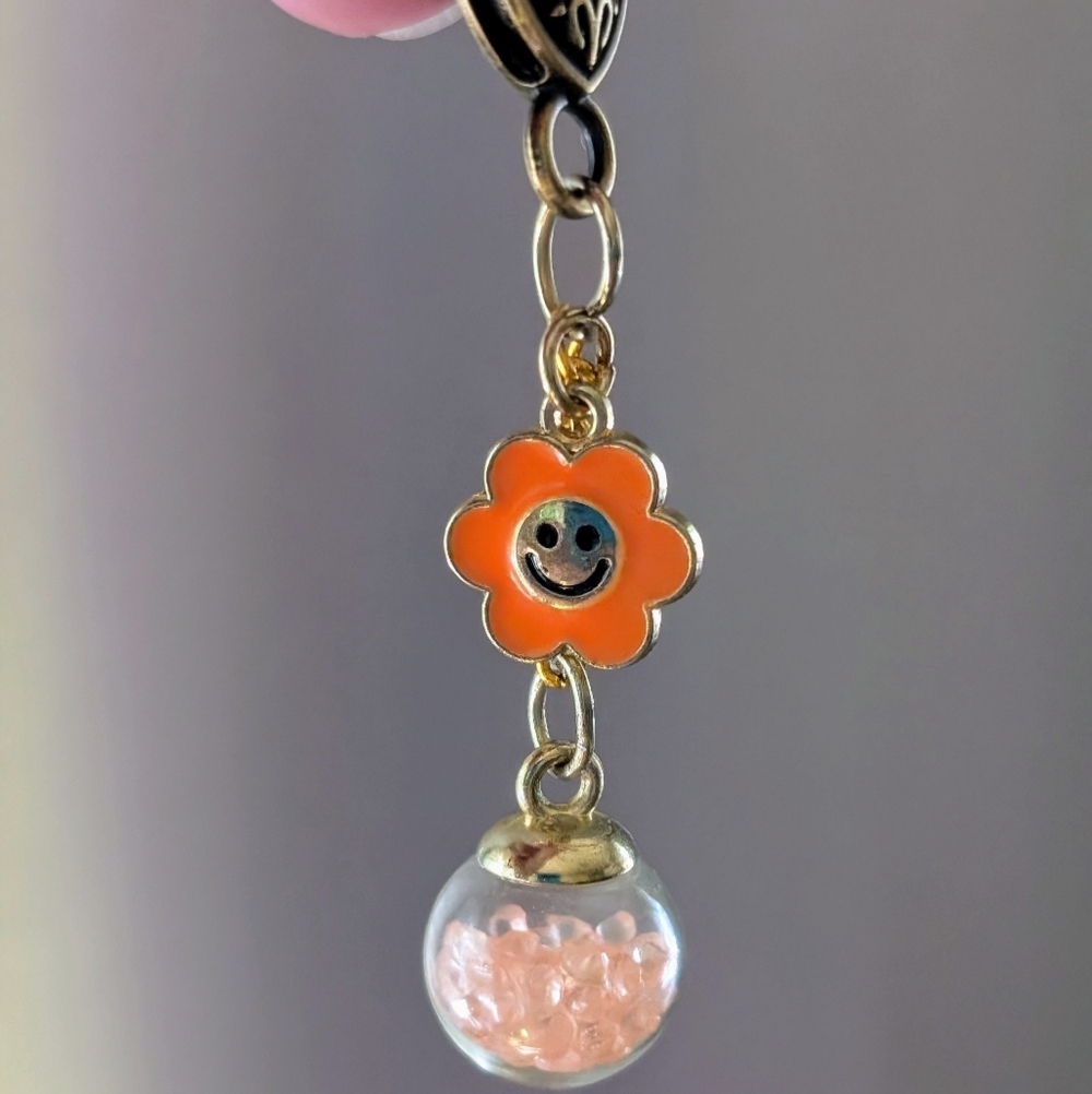 Orange Flower Charm Bag Charm With Fun Bead Globe